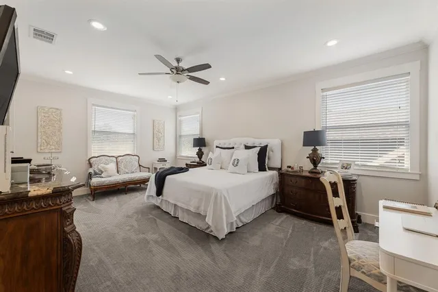 a bedroom with a bed and furniture