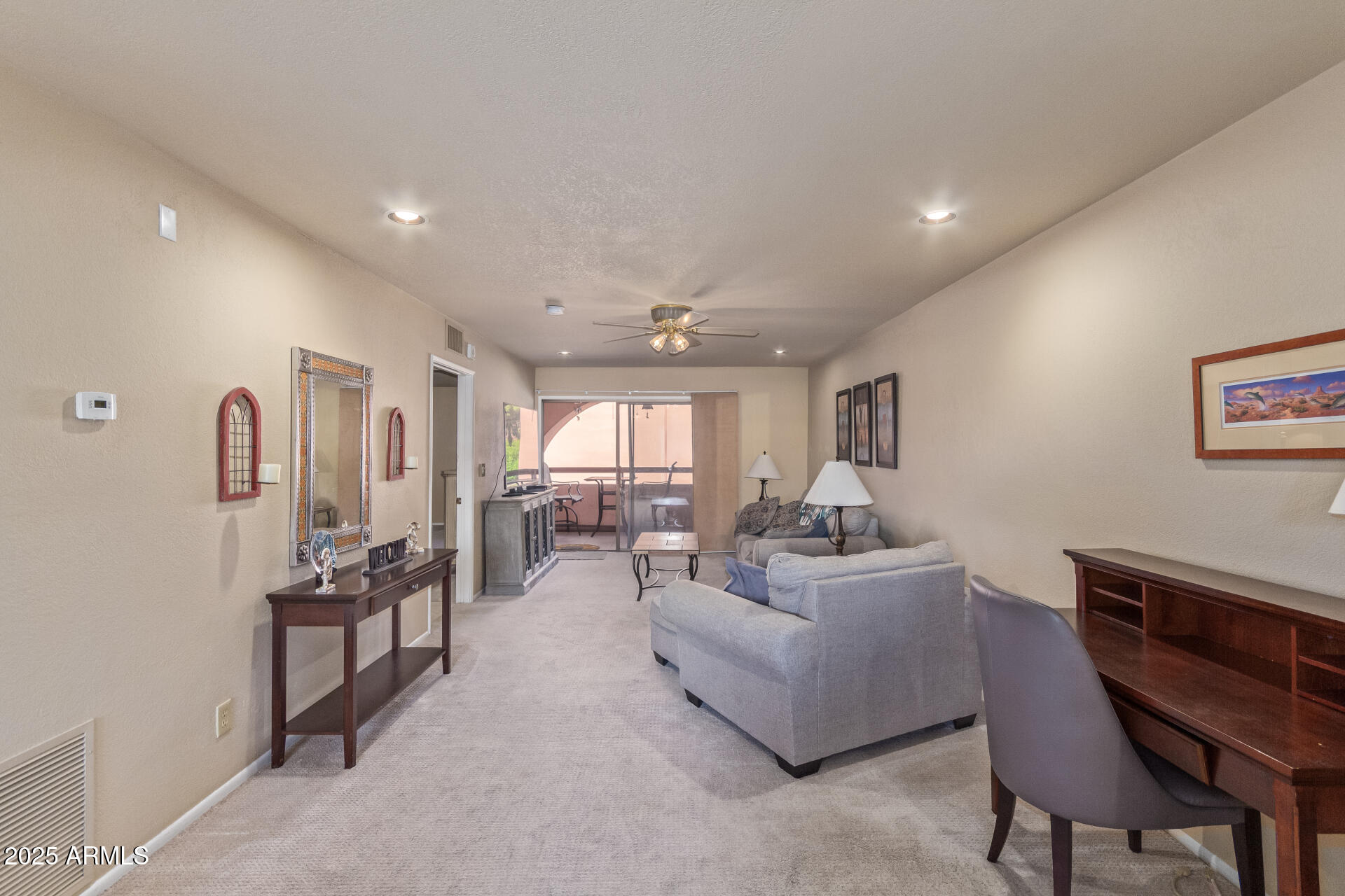 4303 East Cactus Road, Unit 202 Phoenix, AZ 85032 - Photo 2 of 34 a living room with furniture and wooden floor