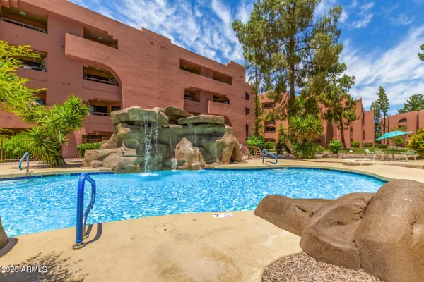 a view of a swimming pool and outdoor space