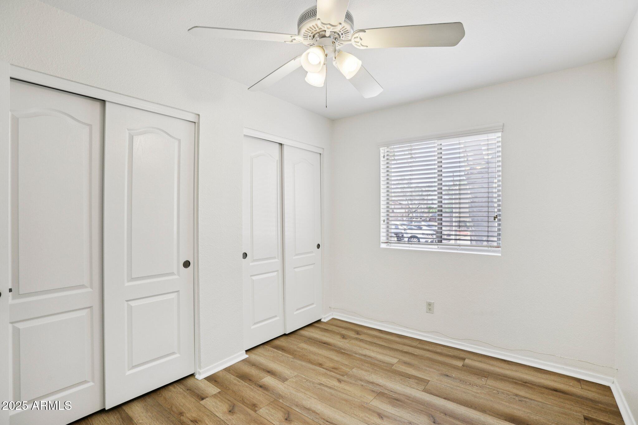 303 North Miller Road, Unit 1001 Scottsdale, AZ 85257 - Photo 10 of 20 a view of an empty room with a window