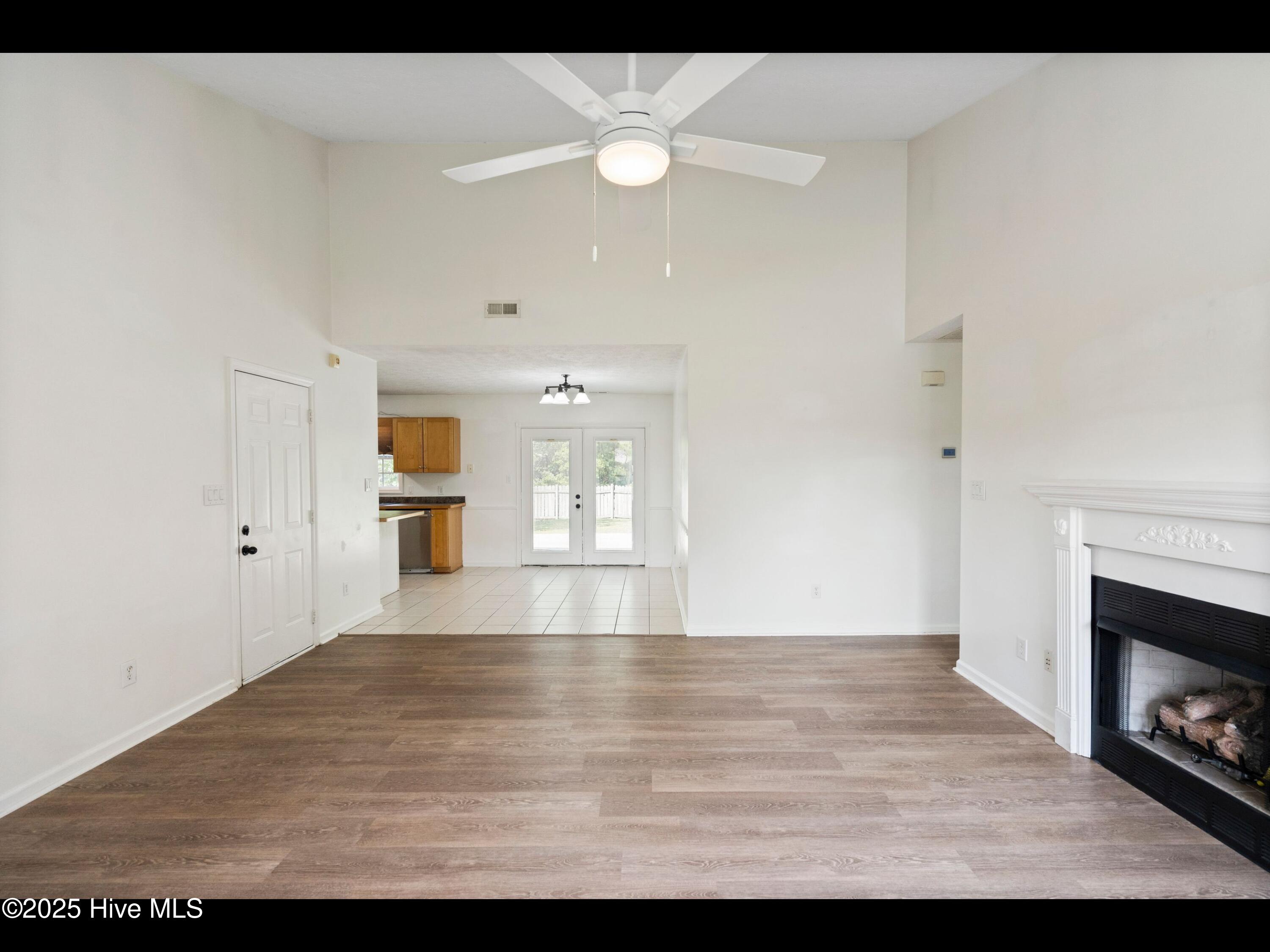 328 Foxhall Road Newport, NC 28570 - Photo 2 of 22 Living Area into Dining Area