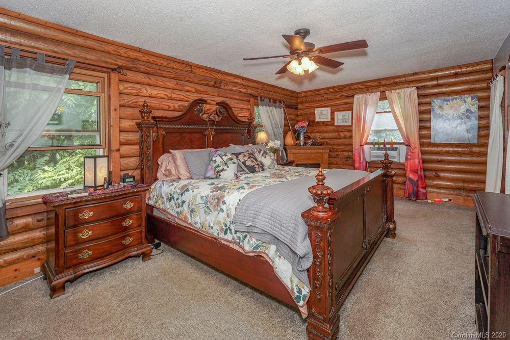 1471 J J Rhyne Reep Road Vale, NC 28168 - Photo 19 of 43 a bed room with a bed and a large window