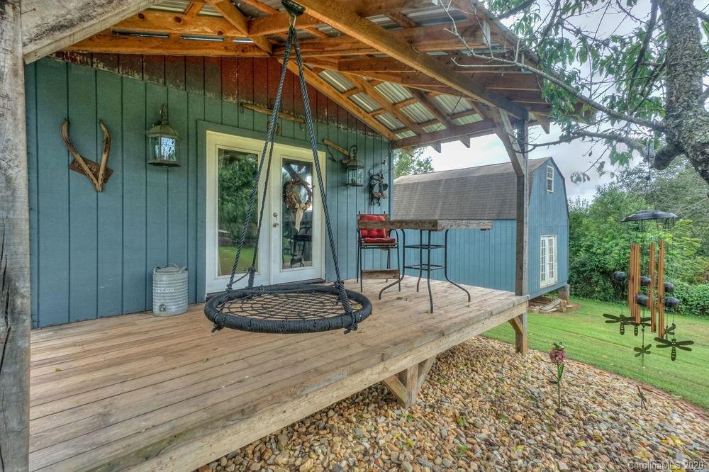 1471 J J Rhyne Reep Road Vale, NC 28168 - Photo 28 of 43 a view of a backyard with table and chairs potted plants