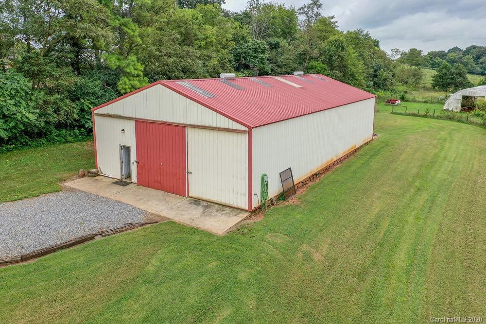 1471 J J Rhyne Reep Road Vale, NC 28168 - Photo 6 of 43 a view of a backyard with a garden