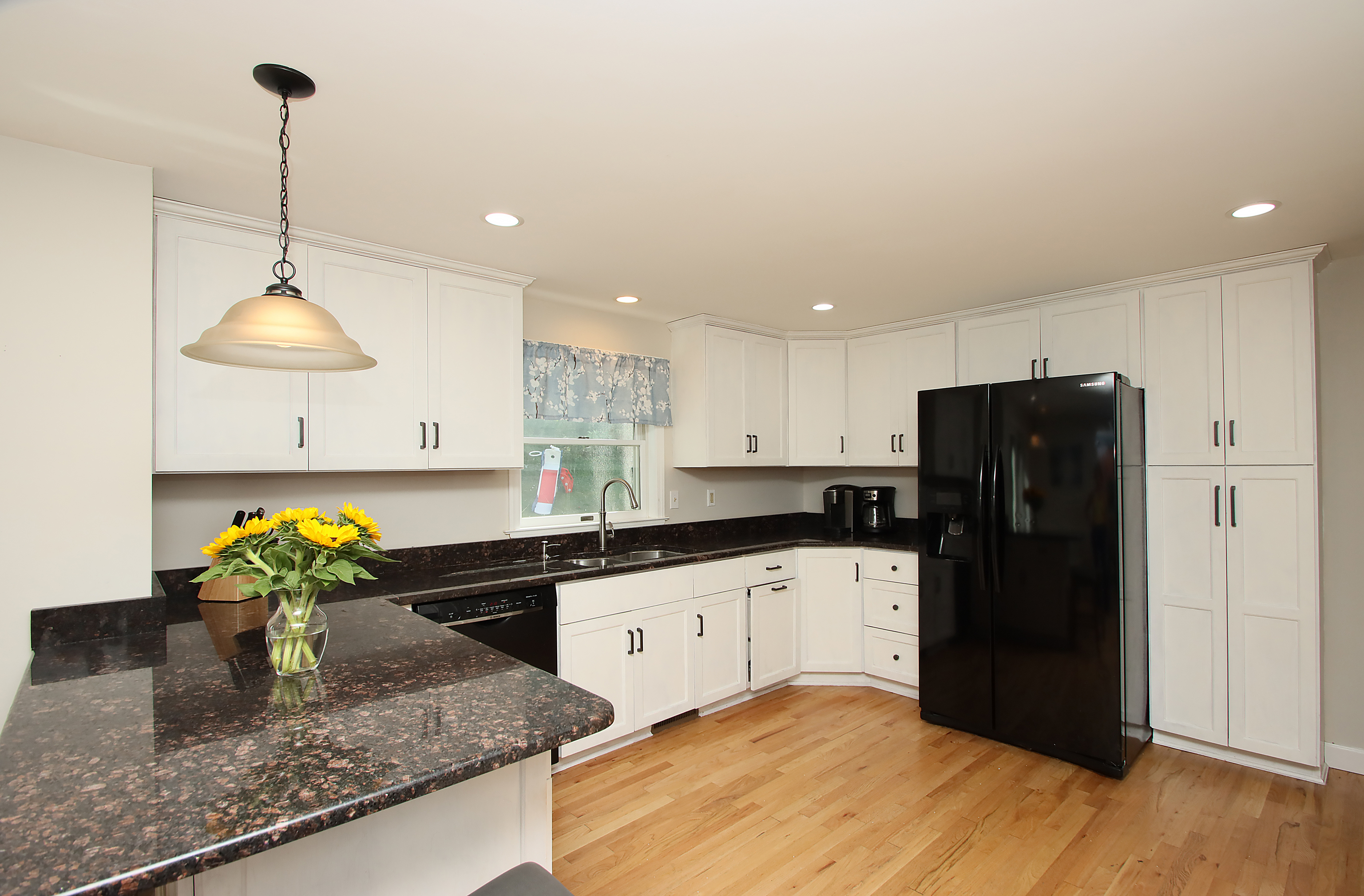 4 Stone Dam Road Bethel, CT 06801 - Photo 4 of 13 a kitchen with granite countertop kitchen island stainless steel appliances a sink a counter top space and cabinets