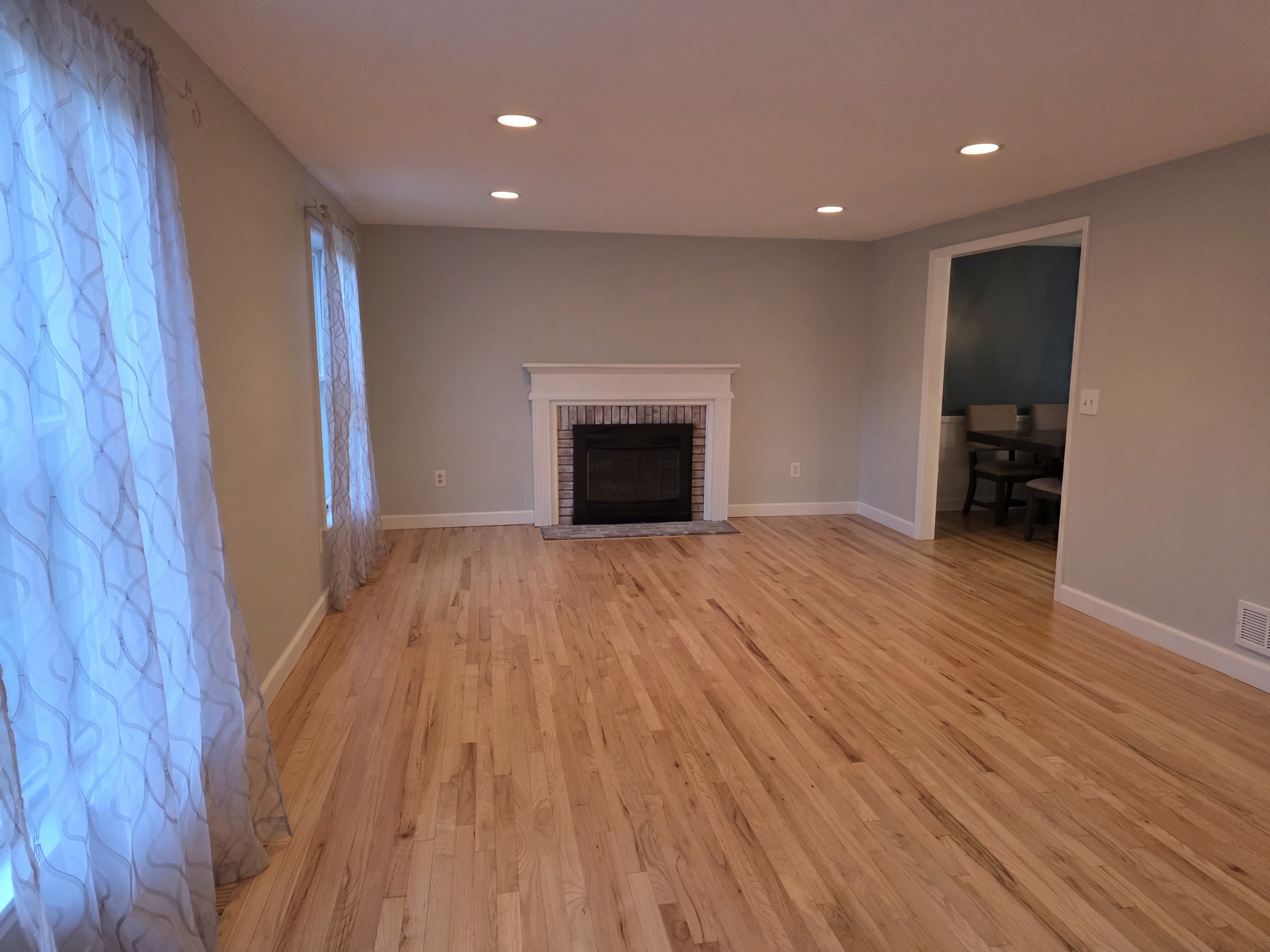 4 Stone Dam Road Bethel, CT 06801 - Photo 9 of 13 a view of an empty room with wooden floor and a window