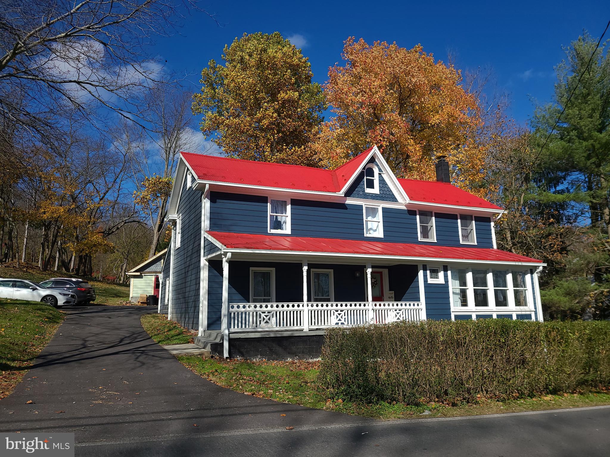 a front view of residential houses with street