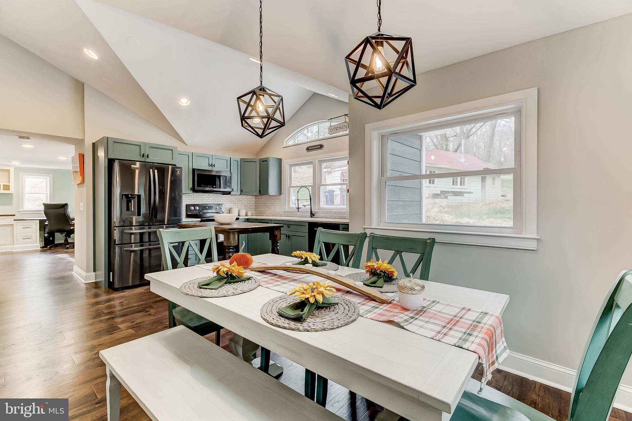 2812 Cape Horn Road Westminster, MD 21157 - Photo 11 of 40 a view of a dining room with furniture large window and wooden floor