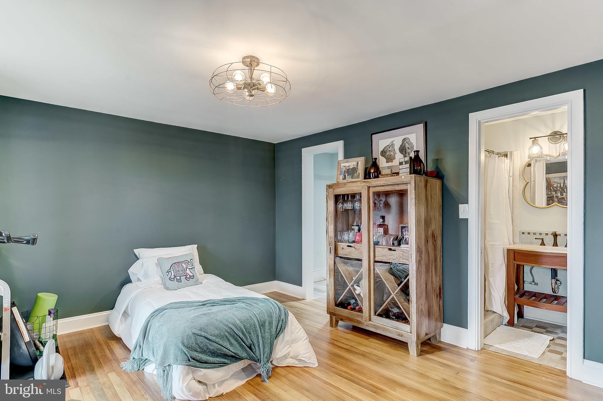 2812 Cape Horn Road Westminster, MD 21157 - Photo 20 of 40 a view of a livingroom with wooden floor and a ceiling fan