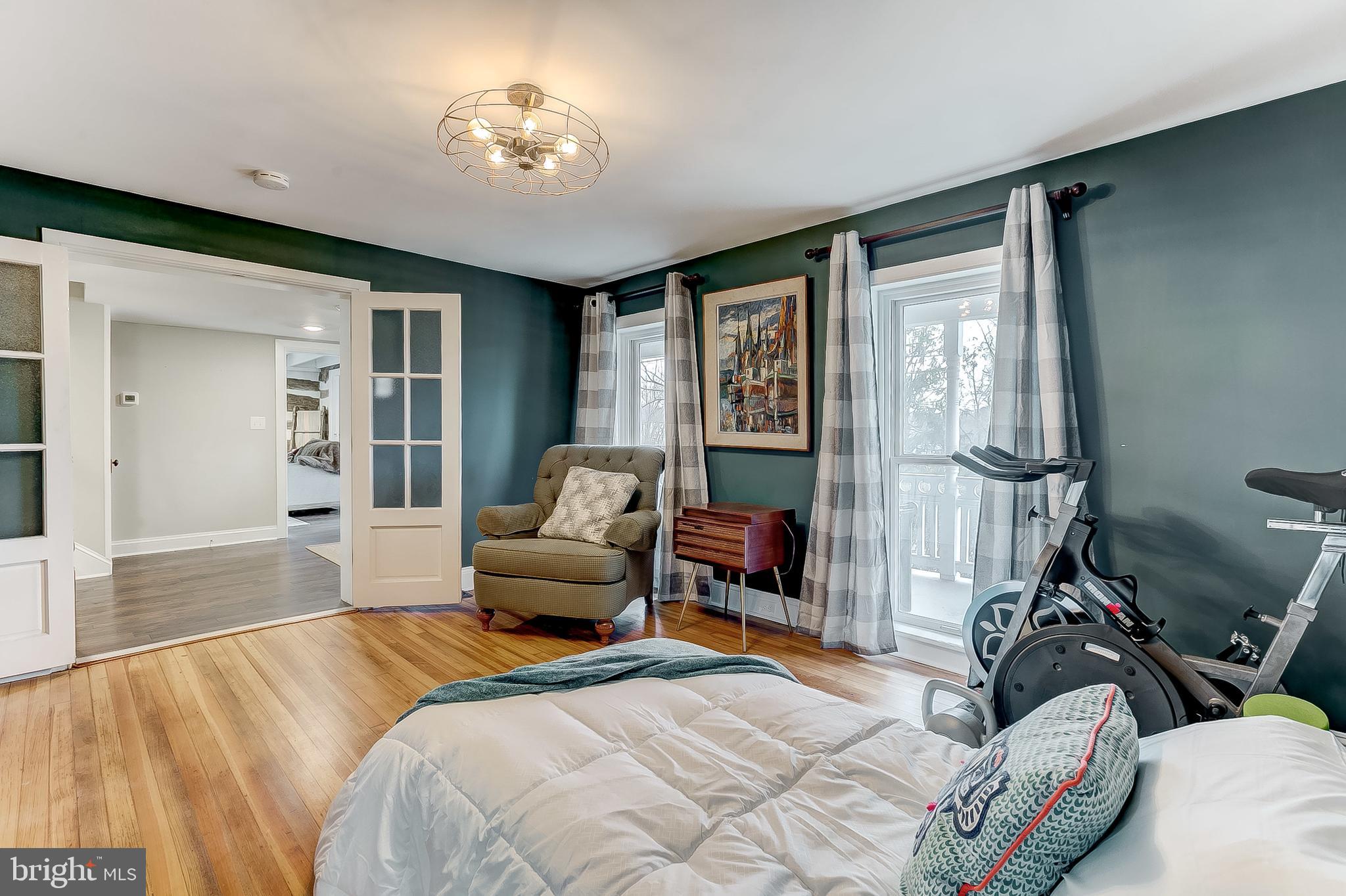2812 Cape Horn Road Westminster, MD 21157 - Photo 21 of 40 a bedroom with a bed and wooden floor