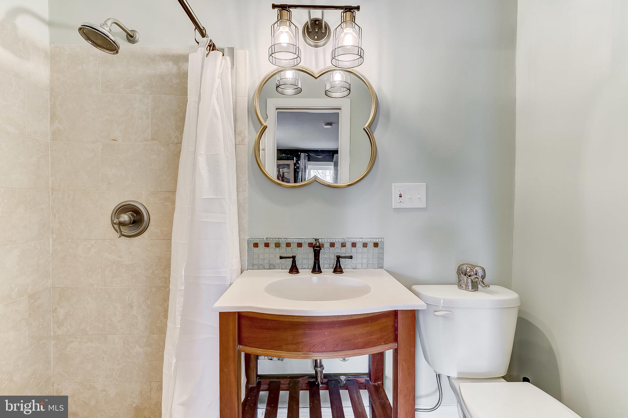 2812 Cape Horn Road Westminster, MD 21157 - Photo 22 of 40 a bathroom with a toilet and sink