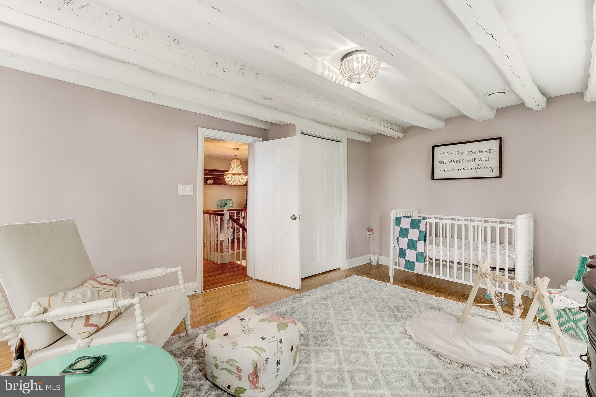 2812 Cape Horn Road Westminster, MD 21157 - Photo 31 of 40 a bedroom with a bed and wooden floor