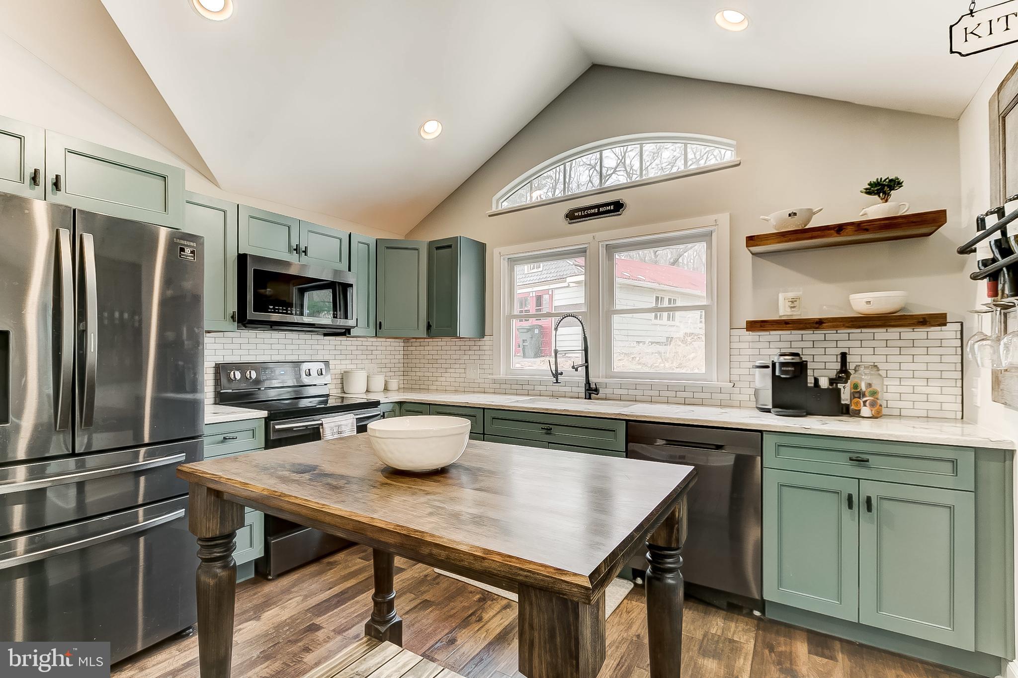 2812 Cape Horn Road Westminster, MD 21157 - Photo 5 of 40 a kitchen with granite countertop a sink appliances cabinets and counter space