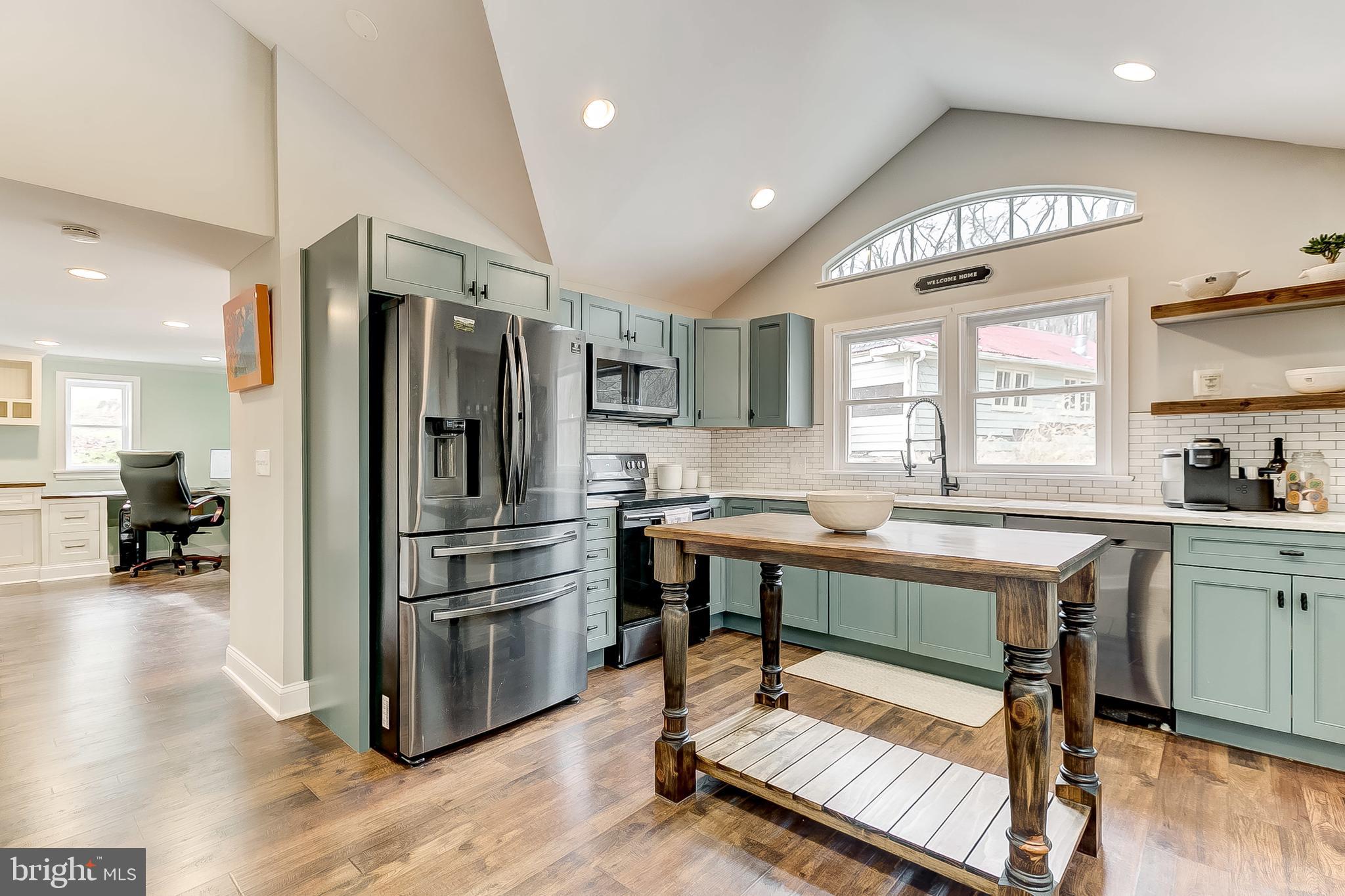 2812 Cape Horn Road Westminster, MD 21157 - Photo 6 of 40 a kitchen with a sink appliances and cabinets