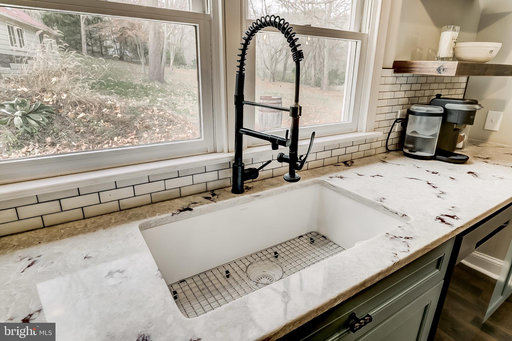 2812 Cape Horn Road Westminster, MD 21157 - Photo 10 of 40 a room with a table and a flat screen tv