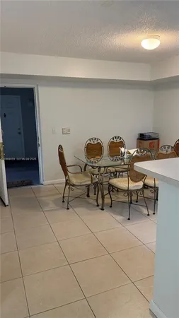 a view of a workspace with furniture