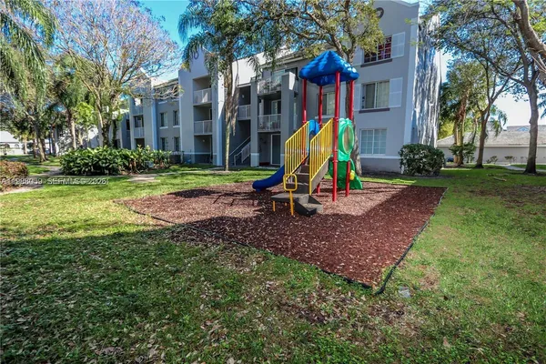 a view of a house with a park