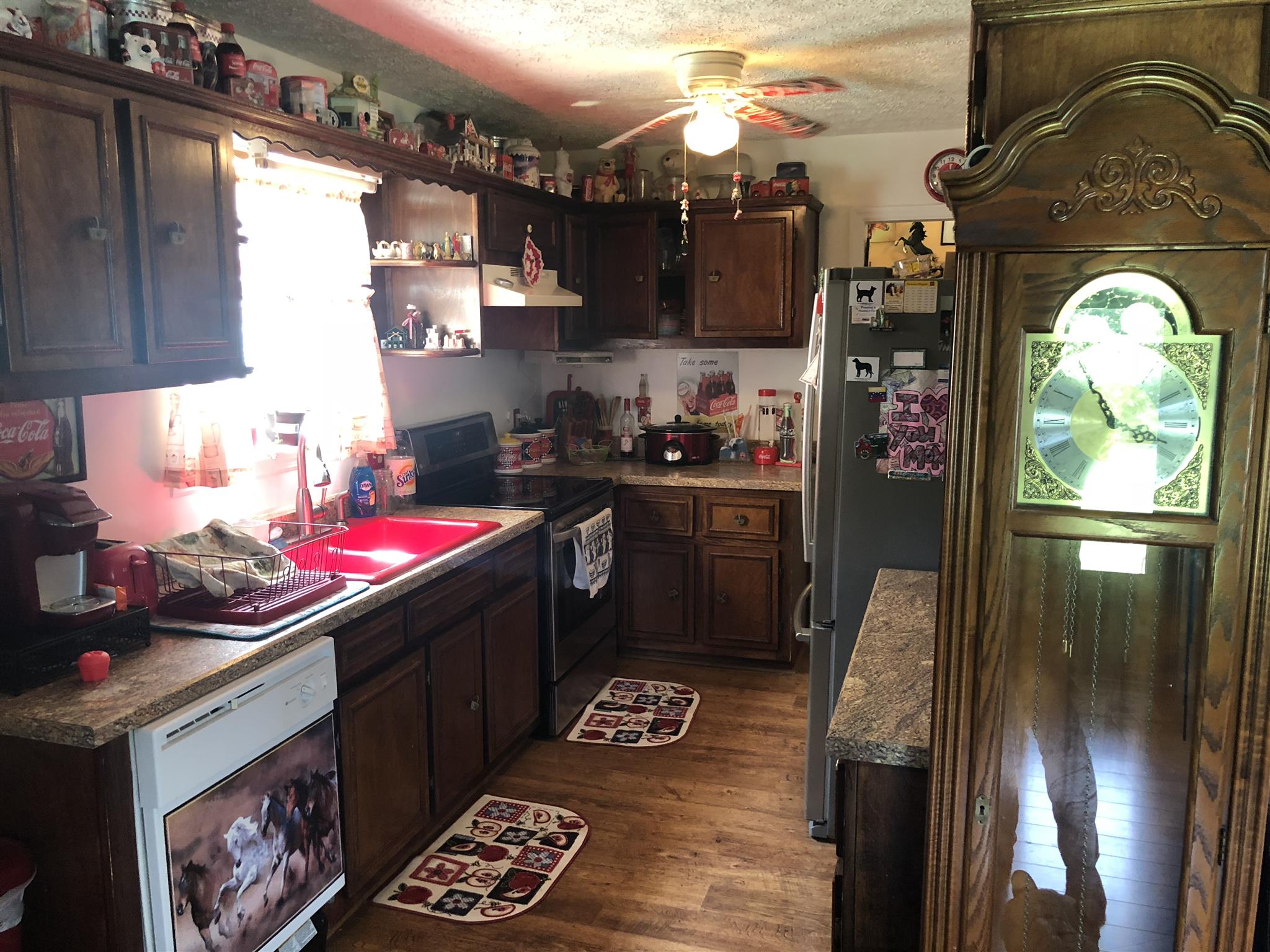 922 Harpo Road Manchester, TN 37355 - Photo 12 of 17 a kitchen with a sink cabinets and stainless steel appliances