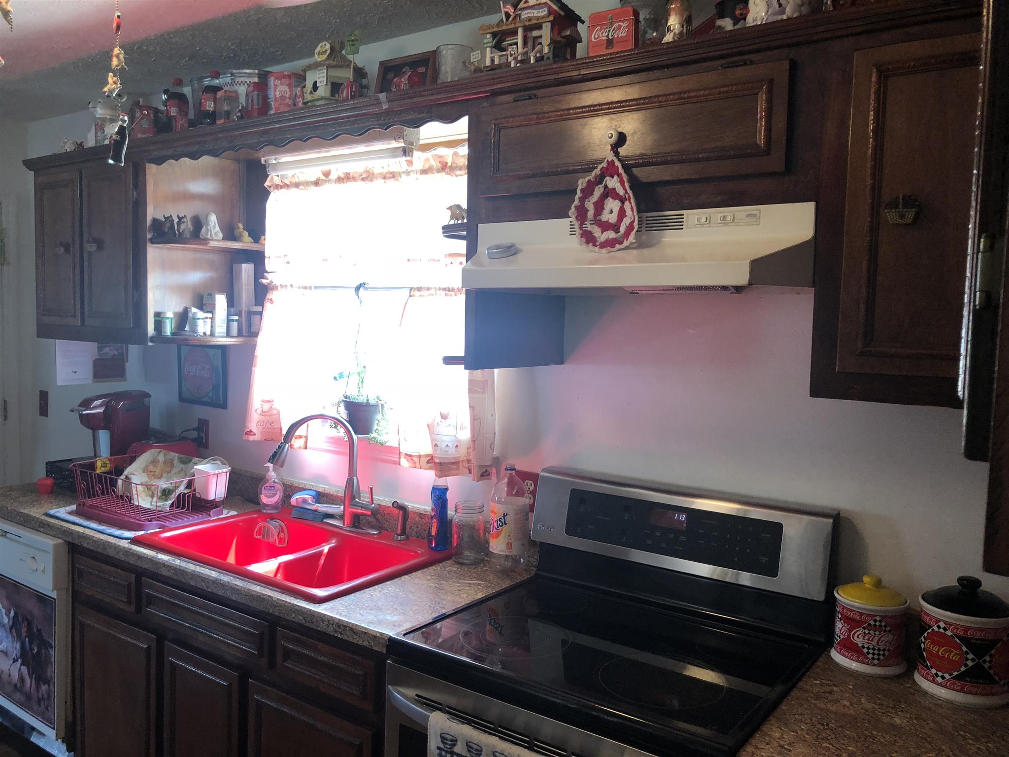 922 Harpo Road Manchester, TN 37355 - Photo 13 of 17 a kitchen with a stove and cabinets