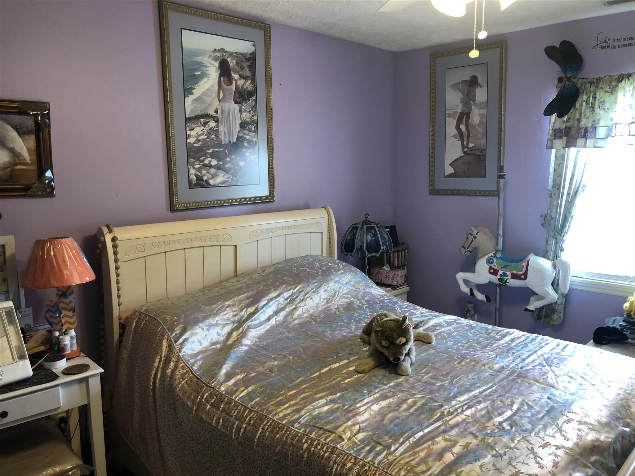922 Harpo Road Manchester, TN 37355 - Photo 16 of 17 a bed sitting in a bedroom next to a window