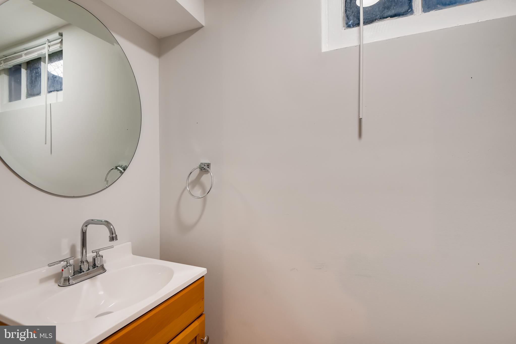 1615 Gleneagle Road Baltimore, MD 21239 - Photo 30 of 32 Lower Level Half Bath!