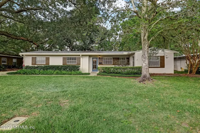 a house view with a garden space