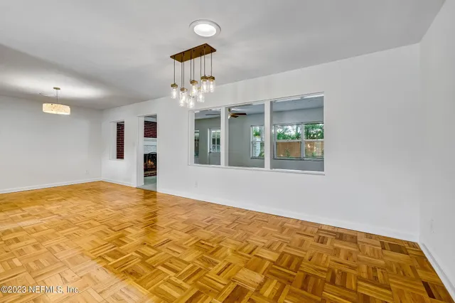 a view of an empty room and window