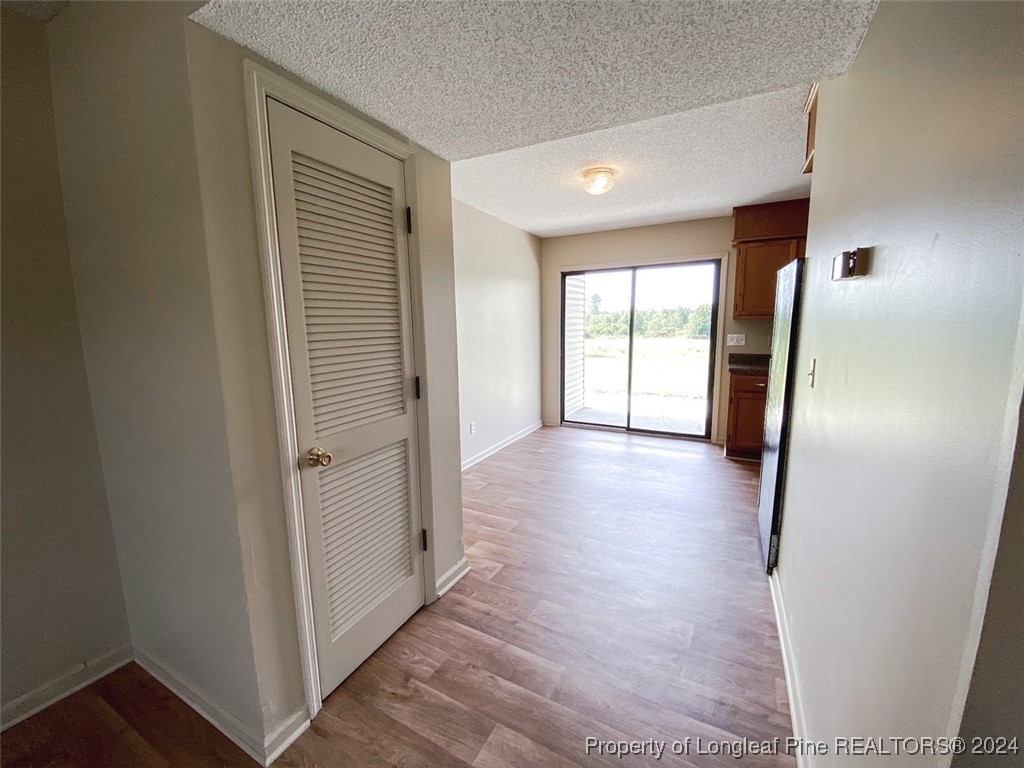 1829 Horne Camp Road, Unit 2 Fairmont, NC 28340 - Photo 5 of 18 a view of hallway with furniture and a window