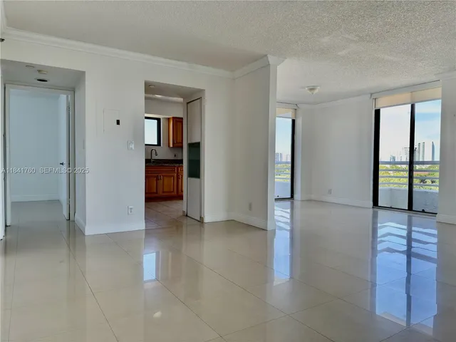 a view of empty room with windows