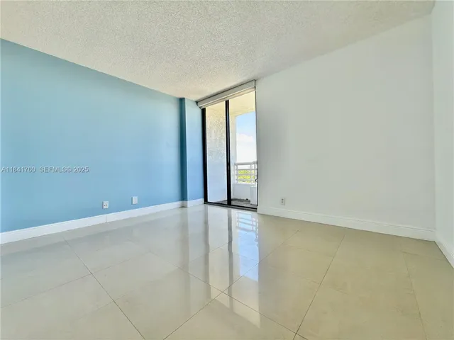 a view of a big room with an empty space