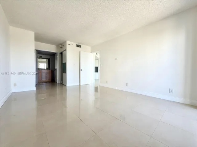 a view of a city with tall buildings