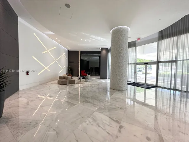 a view of a chairs and table in the back yard