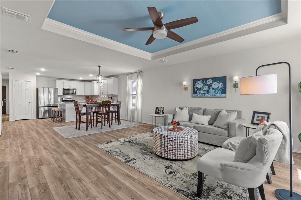 14056 Ilderton Street Pilot Point, TX 76258 - Photo 14 of 34 a living room with furniture and kitchen view