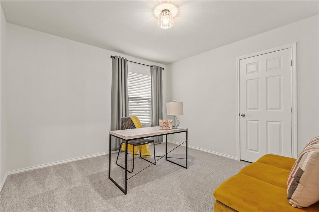 14056 Ilderton Street Pilot Point, TX 76258 - Photo 24 of 34 a view of a livingroom with furniture and window