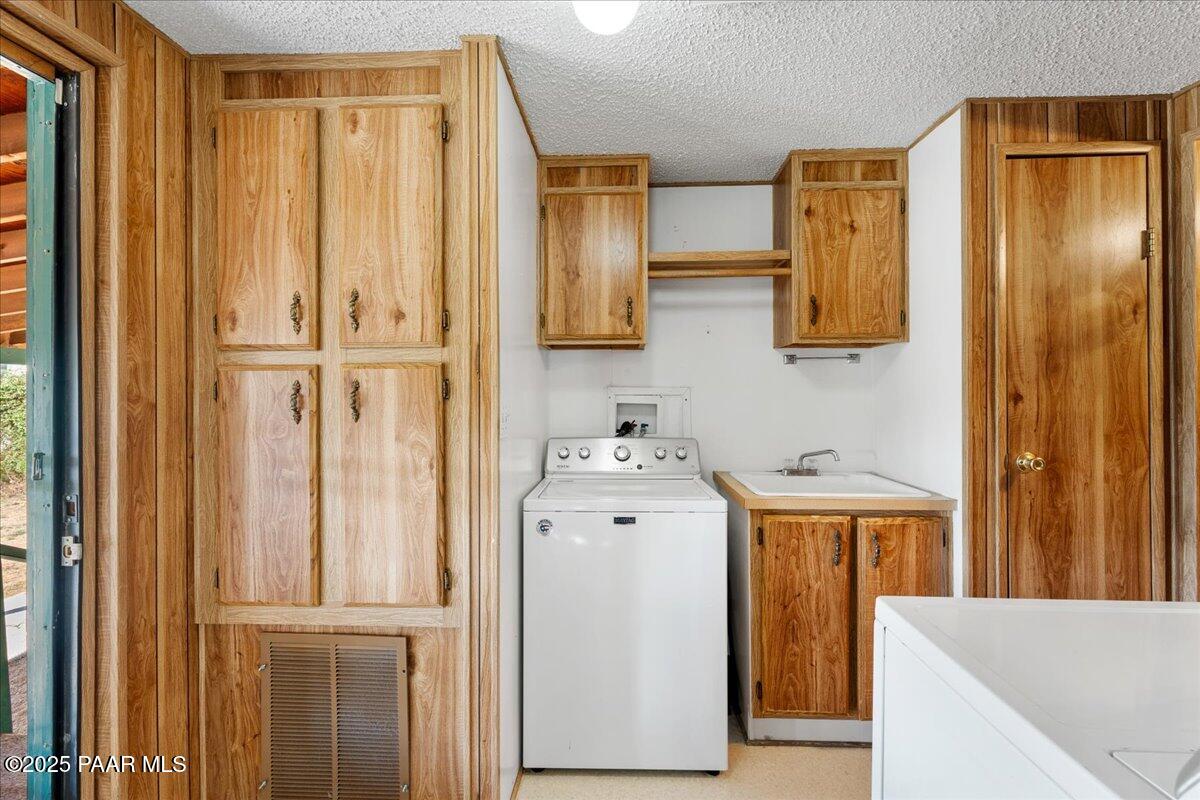 14012 Holly Road Mayer, AZ 86333 - Photo 12 of 28 a view of walk in closet with window