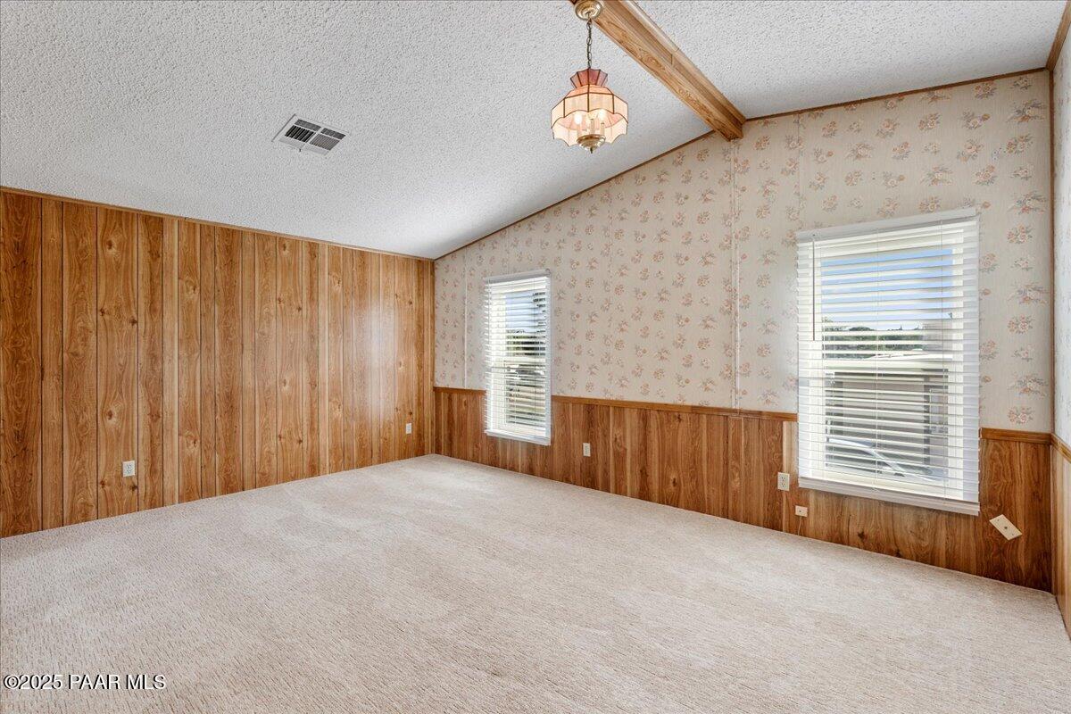 14012 Holly Road Mayer, AZ 86333 - Photo 18 of 28 a view of an empty room with a window
