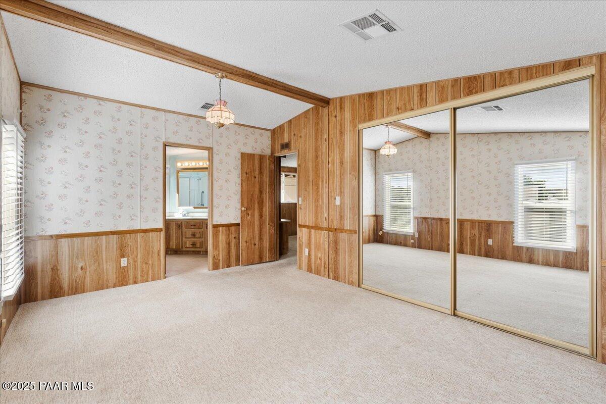 14012 Holly Road Mayer, AZ 86333 - Photo 19 of 28 a view of a bathroom with a tub and shower