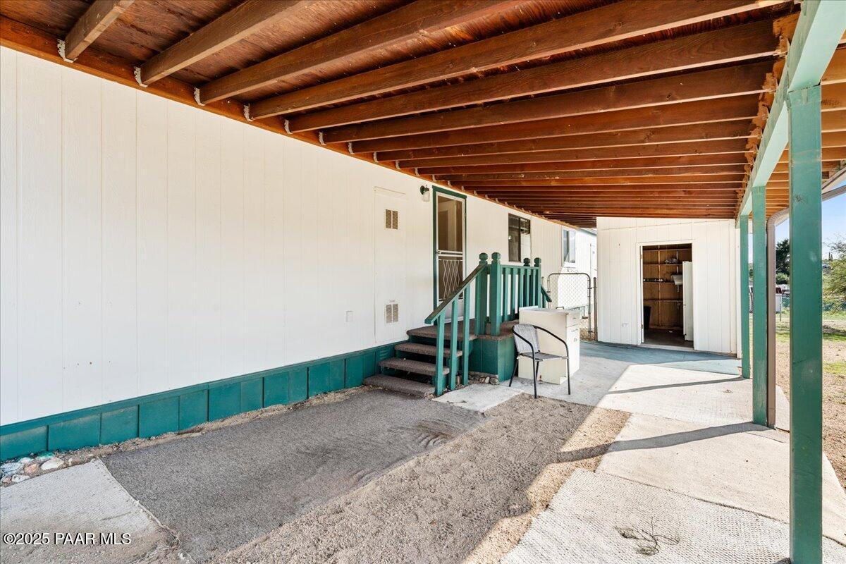 14012 Holly Road Mayer, AZ 86333 - Photo 24 of 28 a view of a backyard