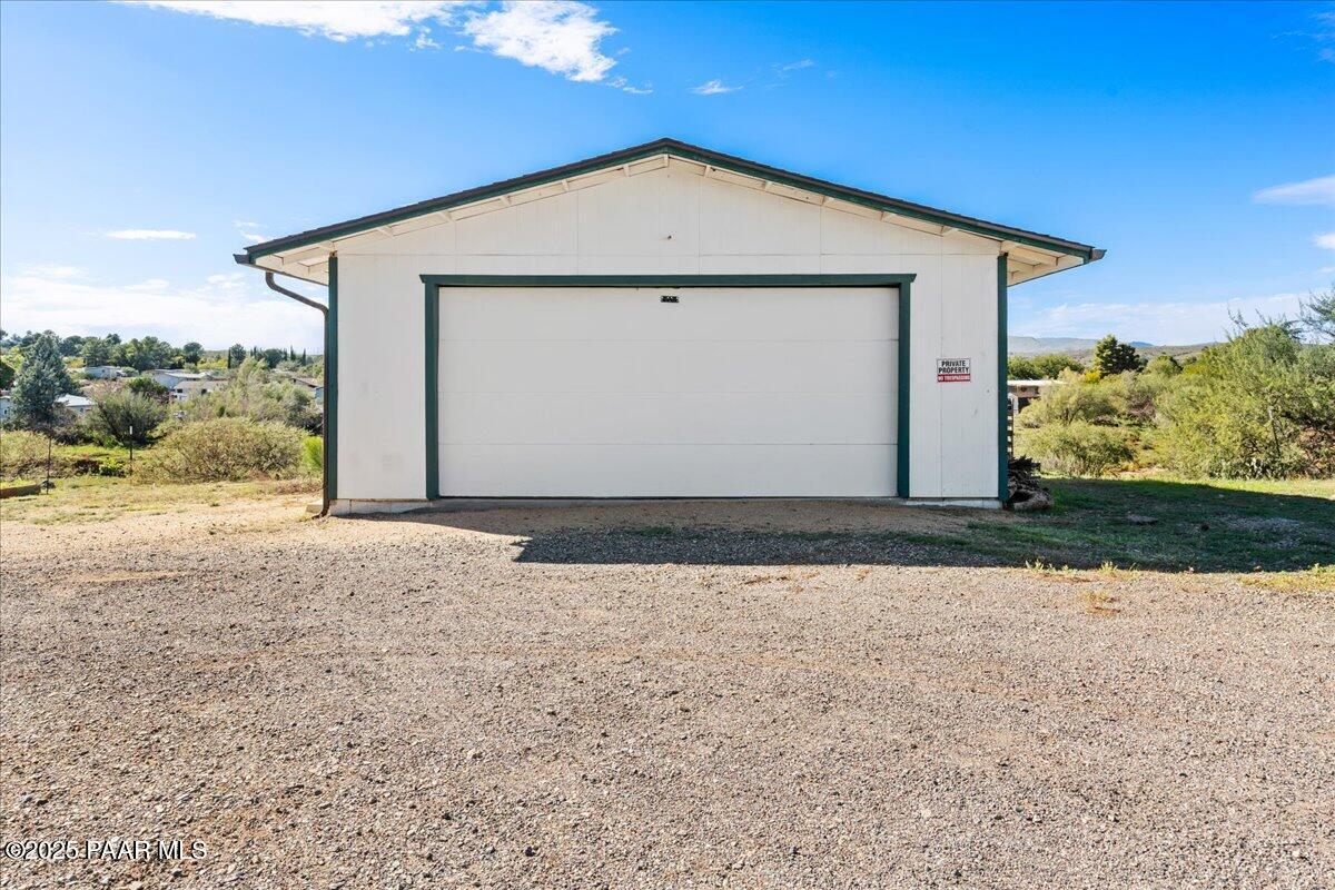 14012 Holly Road Mayer, AZ 86333 - Photo 27 of 28 a view of a house with a yard