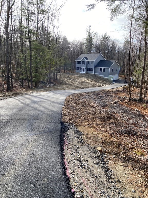 Lot 10 Glenwood Road Rutland, MA 01543 - Photo 2 of 39 a view of house with outdoor space and trees