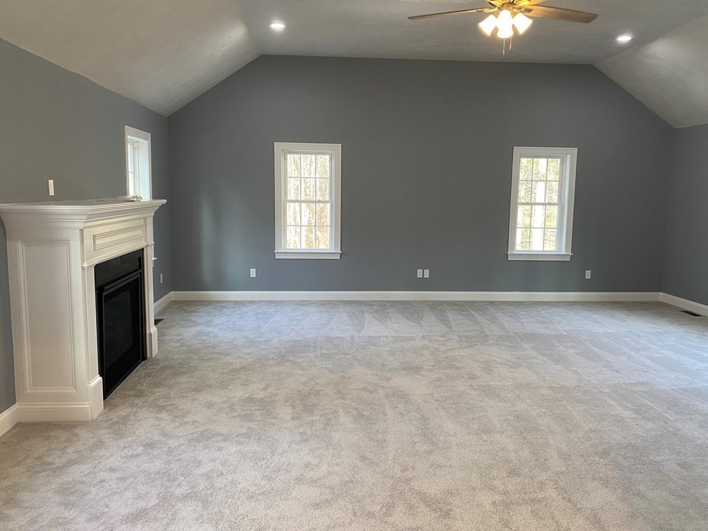 Lot 10 Glenwood Road Rutland, MA 01543 - Photo 9 of 39 a view of an empty room with window and fireplace