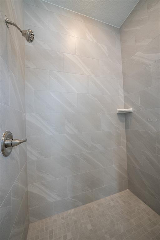 4727 Southeast 25th Loop Ocala, FL 34480 - Photo 14 of 29 a bathroom with a shower