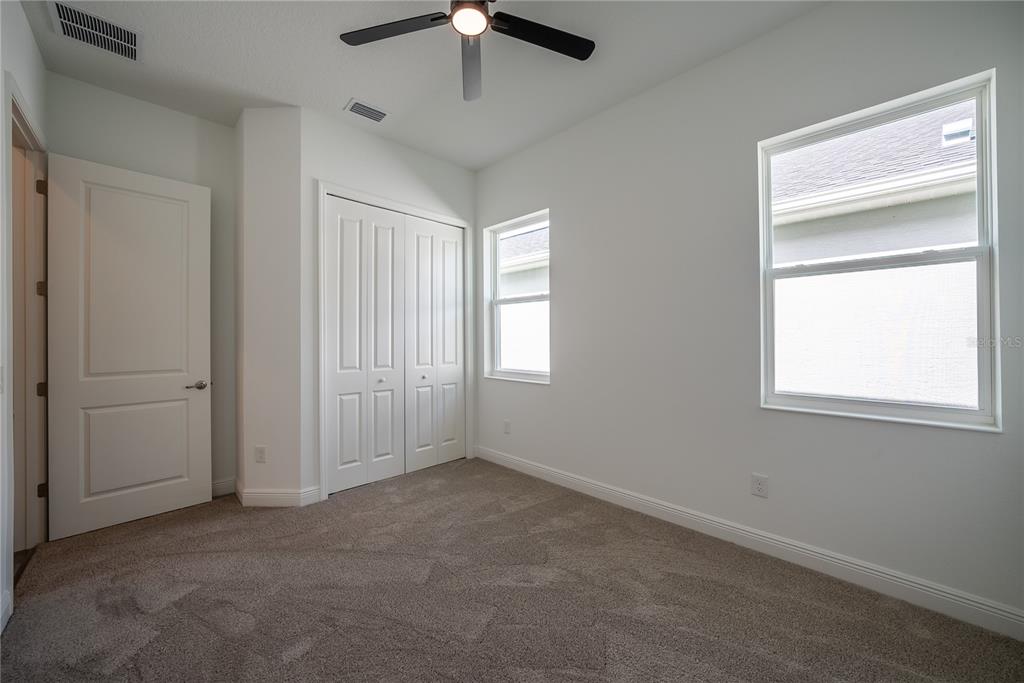 4727 Southeast 25th Loop Ocala, FL 34480 - Photo 20 of 29 a view of an empty room with a window