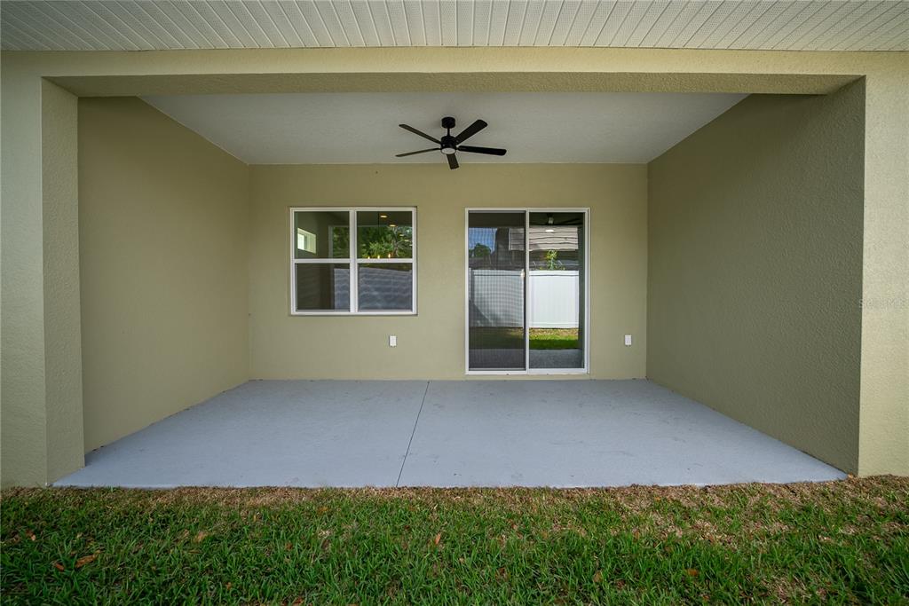 4727 Southeast 25th Loop Ocala, FL 34480 - Photo 25 of 29 an empty room with windows and ceiling fan