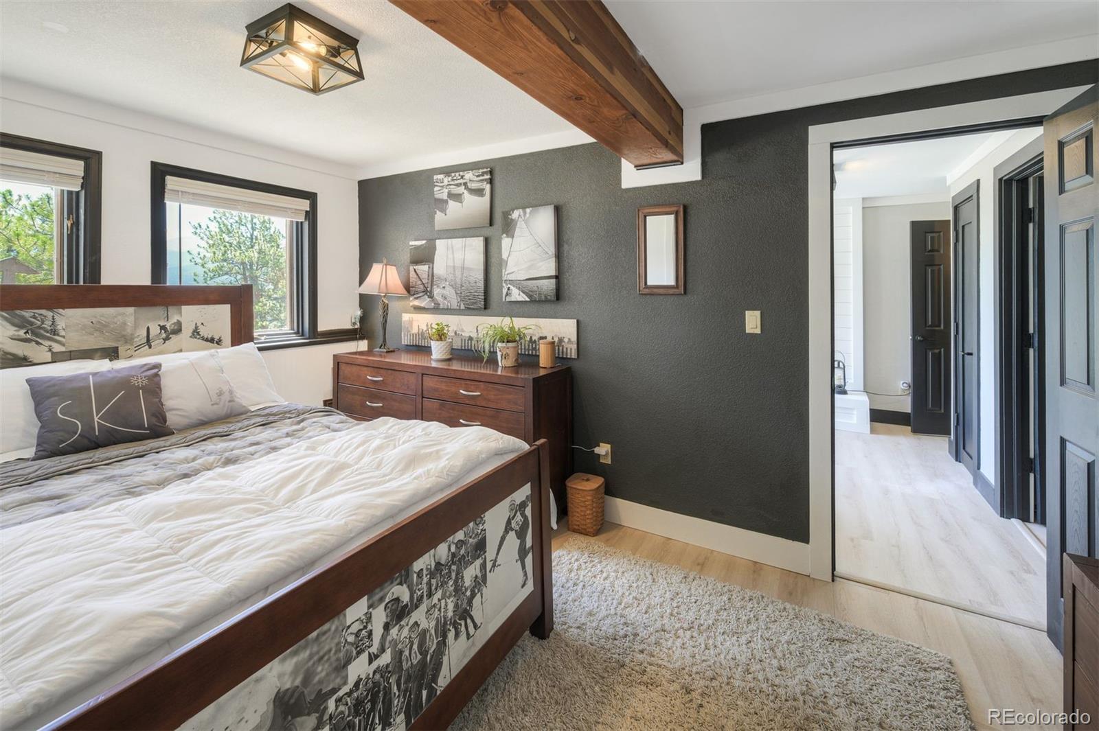 630 Reva Ridge Road Twin Lakes, CO 81251 - Photo 30 of 40 a bed room with a bed and a dresser