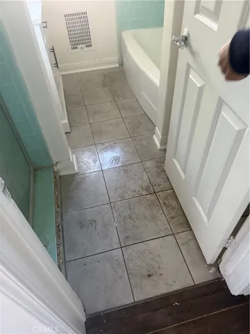 a bathroom with a sink and toilet