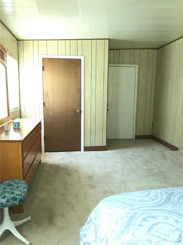 a view of a bedroom with closet