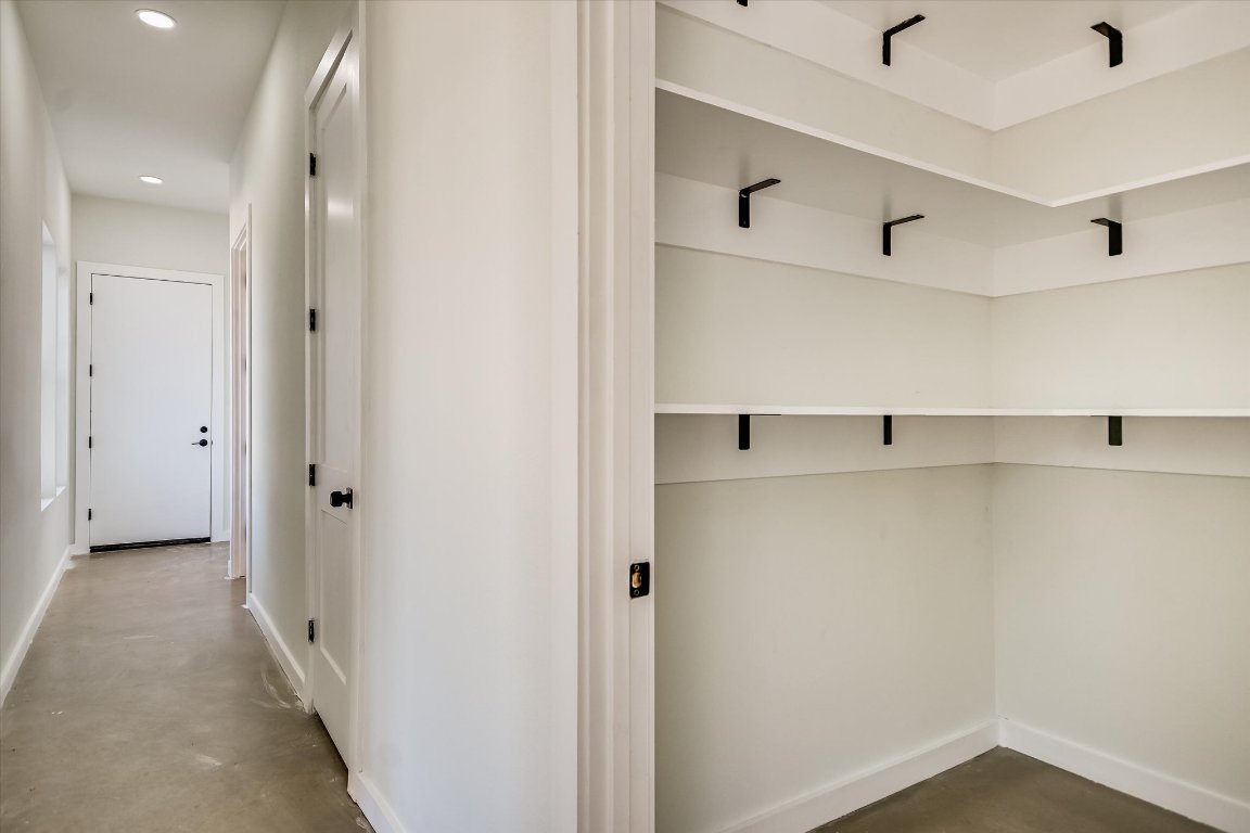 54 War Bonnet Wimberley, TX 78676 - Photo 15 of 32 a view of a hallway with closet