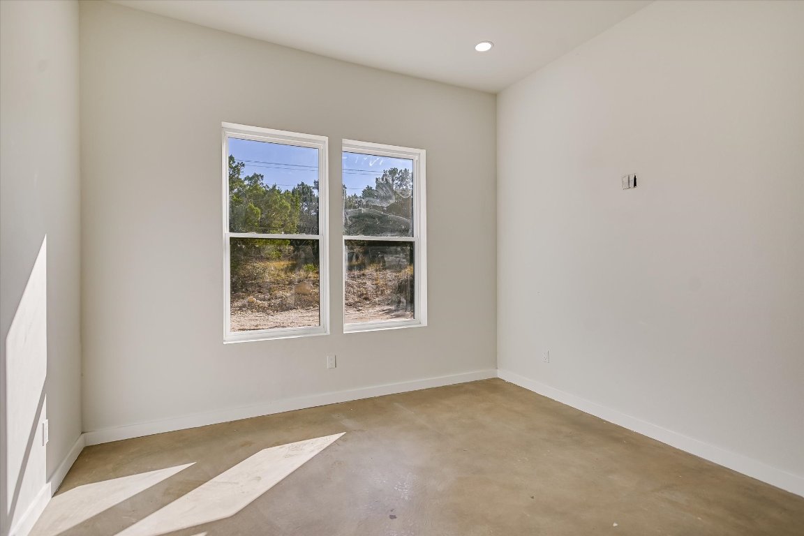 54 War Bonnet Wimberley, TX 78676 - Photo 18 of 32 an empty room with a window