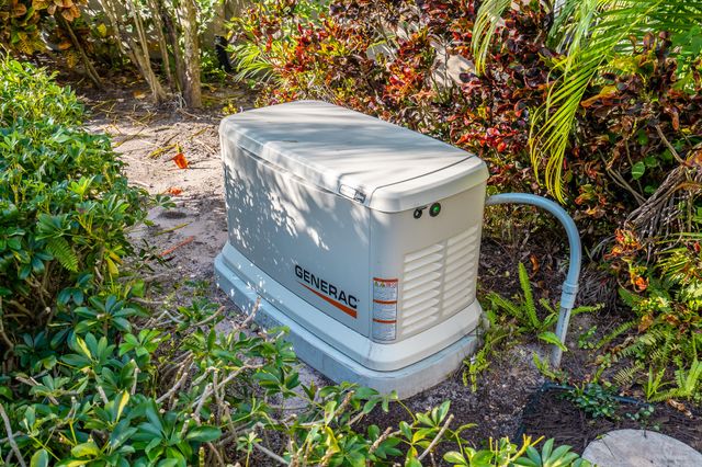 an aerial view of residential house with outdoor space and swimming pool